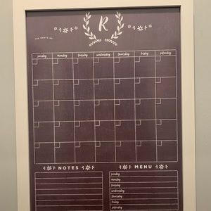 Chalkboard with monogram R at the top